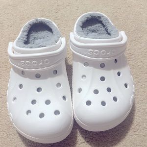 White Crocs with lining. New with tags.